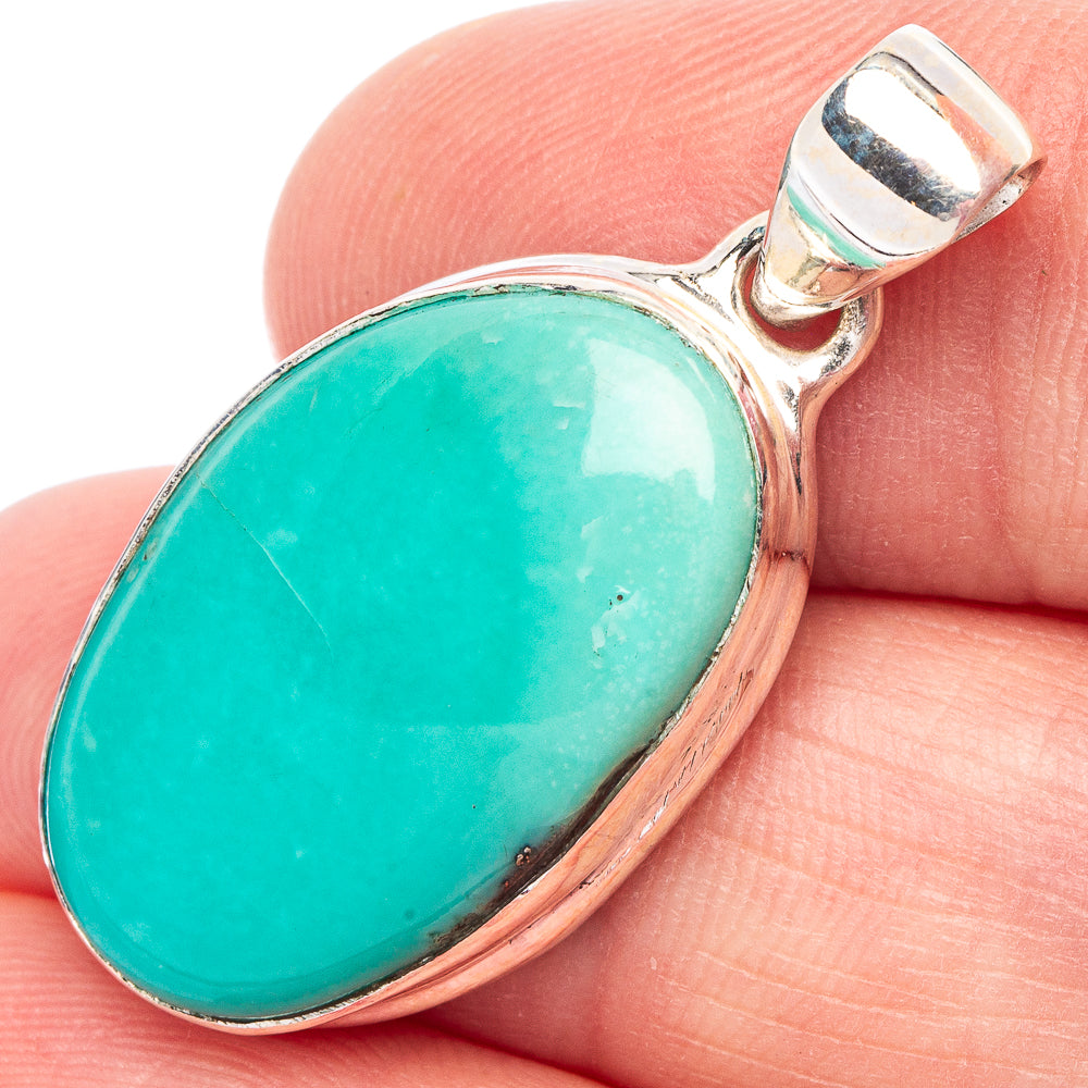 Oval Persian turquoise pendant with bezel-set cabochon in 925 sterling silver