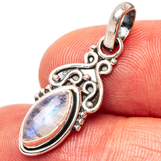 Oval rainbow moonstone pendant in ornate .925 sterling silver setting, close-up