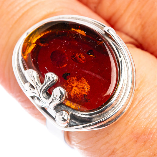 Adjustable .925 sterling silver amber leaf ring with oval dark honey resin cabochon