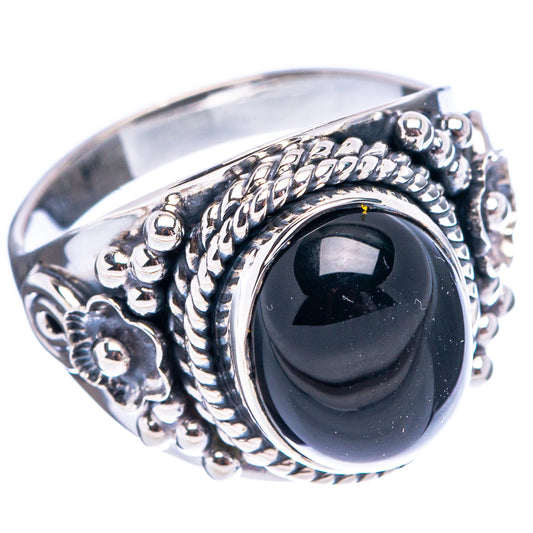 Silver oval black onyx signet-style ring with detailed rope-like bezel.