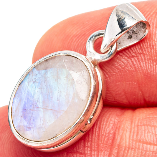 Oval moonstone pendant in .925 sterling silver bezel with teardrop bail, close-up