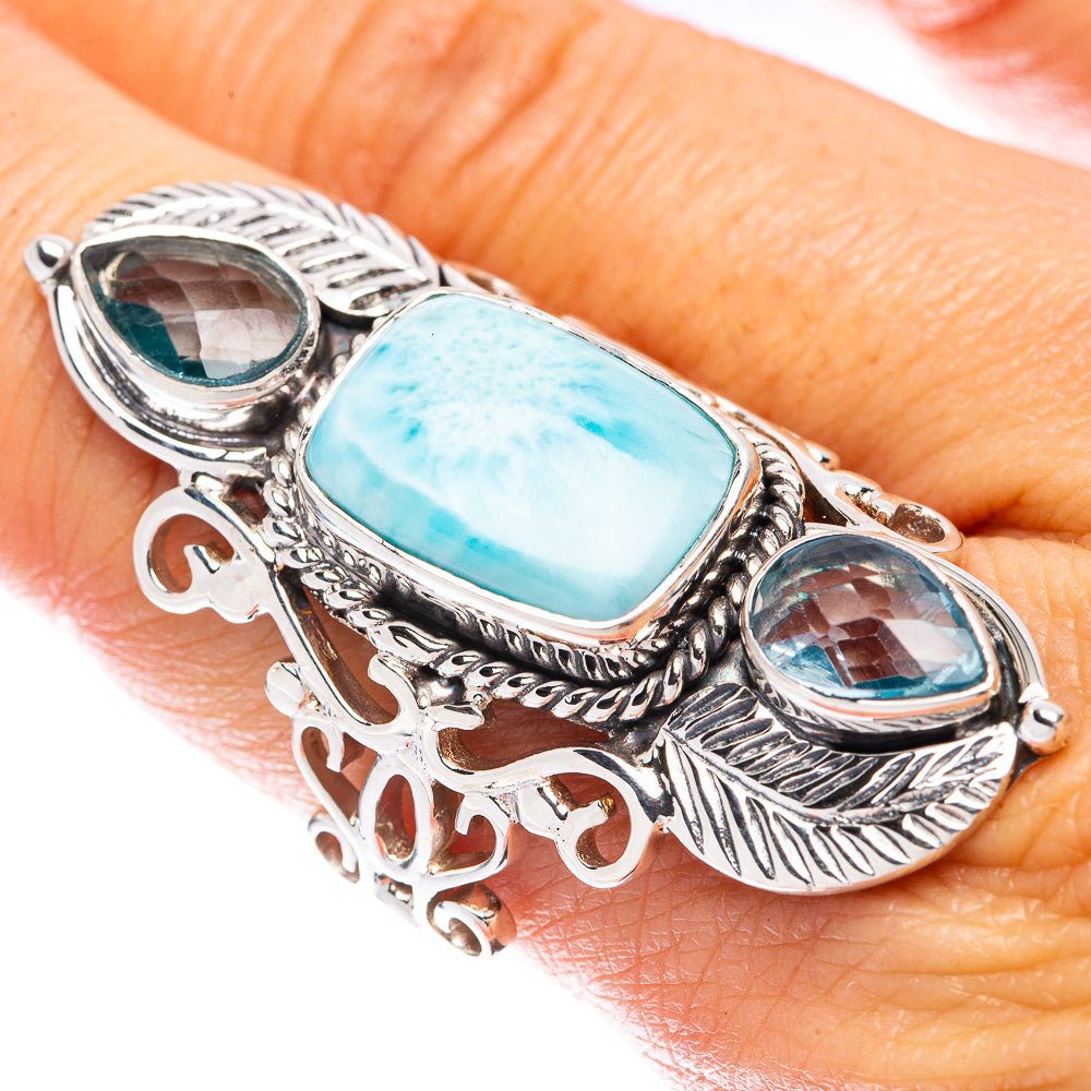 Silver tone statement ring with rectangular light-blue larimar and round blue cabochon
