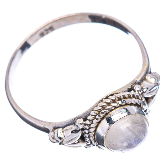 Sterling silver moonstone ring side view with braided band and bezel-set oval stone