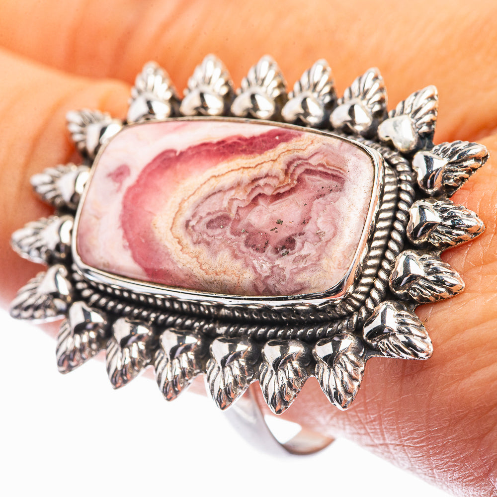 Sterling silver rhodochrosite ring with pink teardrop gemstone and spiked leaf setting