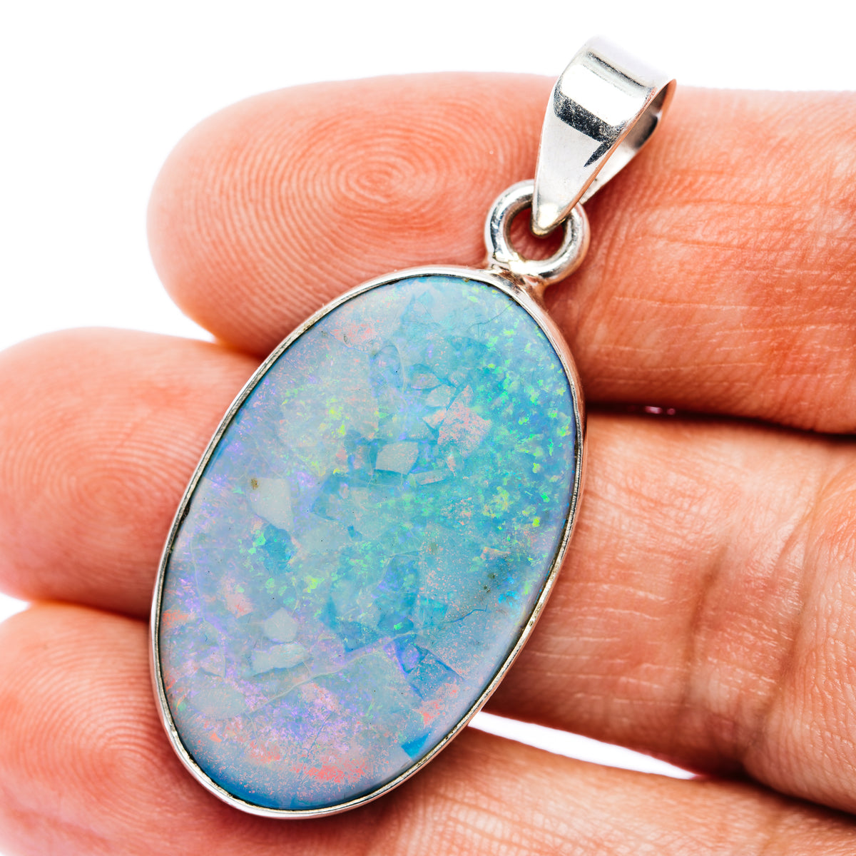 Oval blue opal pendant in .925 sterling silver bezel with top bail