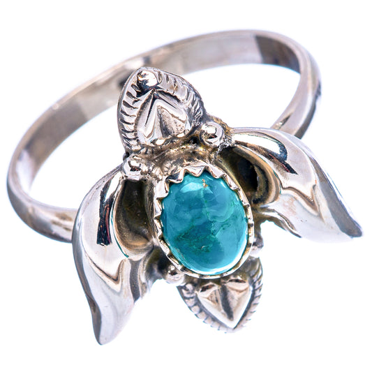 Sterling silver turquoise ring with oval stone and raised feathered eagle motif