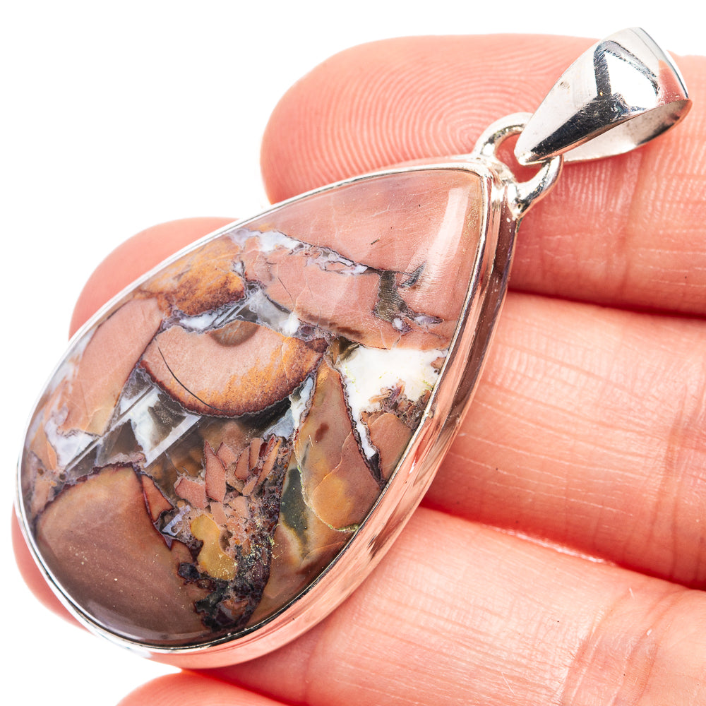 Butterfly jasper pendant close-up, polished 925 sterling silver frame with multicolor stone