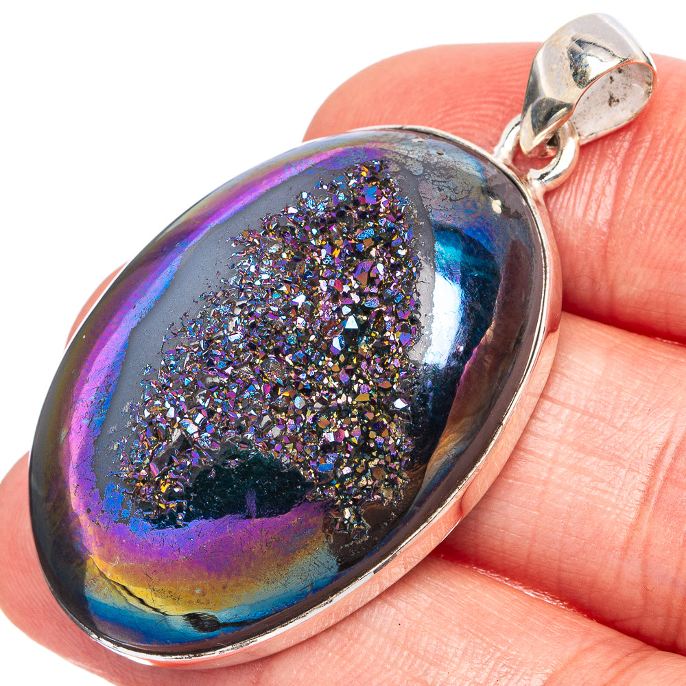 Oval druzy pendant in iridescent purple-blue with glittering crystal texture, silver bail