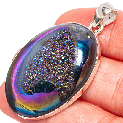 Oval druzy pendant in iridescent purple-blue with glittering crystal texture, silver bail