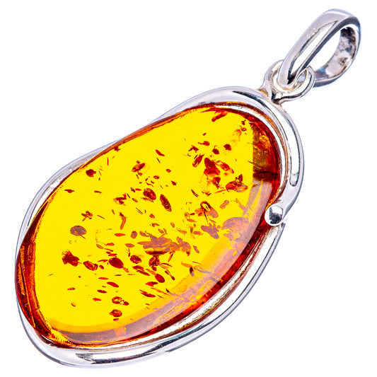 Oval amber pendant with yellow resin flecks and .925 sterling silver frame