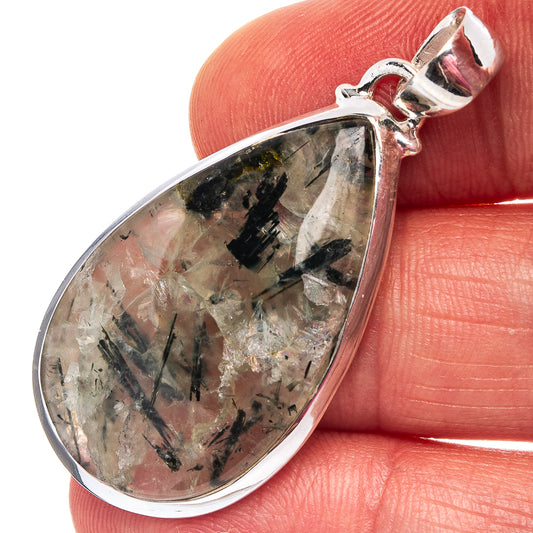 Teardrop prehnite pendant in sterling silver, clear stone with dark needle-like inclusions