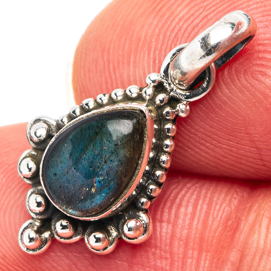 Sterling silver teardrop pendant with blue-green labradorite stone and beaded rim