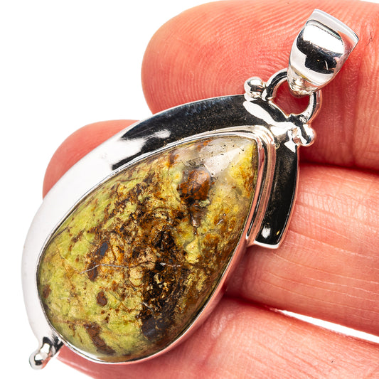 Sterling silver gaspeite teardrop pendant with black-green stone cabochon and bail
