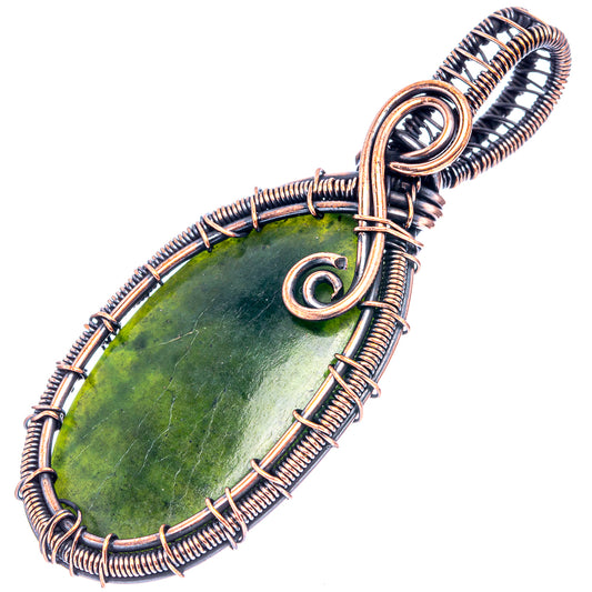 Oval nephrite jade wire-wrap pendant in oxidized copper frame with loops
