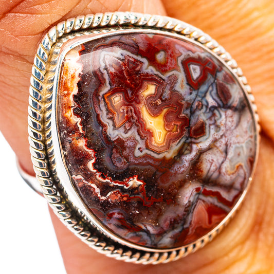 Oval crazy lace agate ring with silver rope bezel and multicolor agate pattern