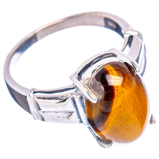 Sterling silver ring with oval tiger's eye cabochon and openwork prong setting