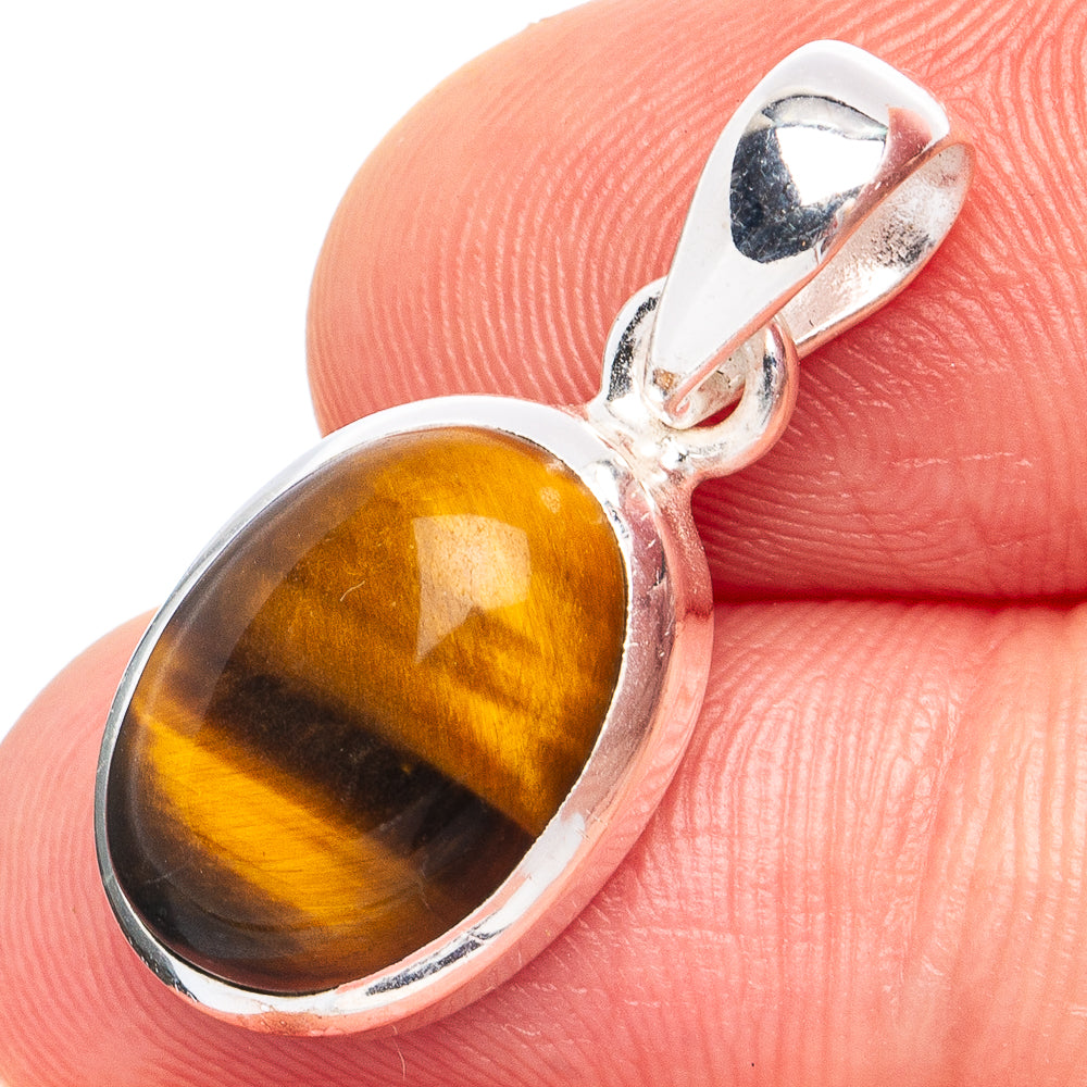 Dainty tiger eye pendant in oval amber-yellow cabochon set in 925 sterling silver.