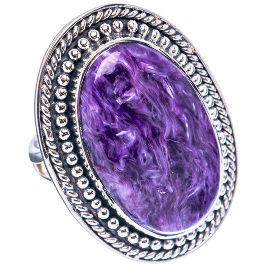 Purple oval cabochon charoite ring with rope and bead sterling silver border