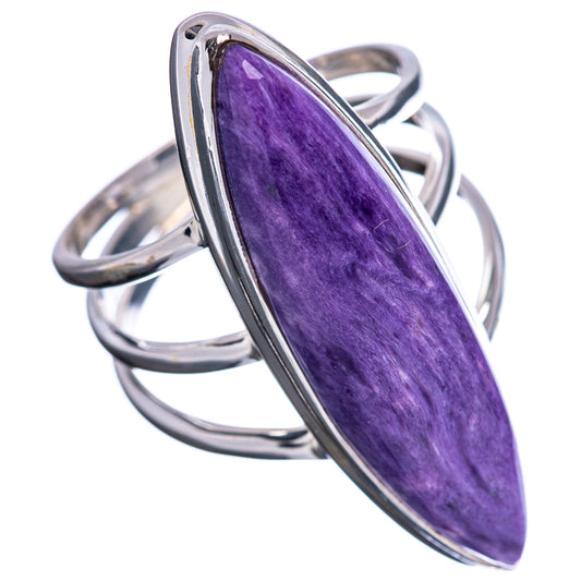 Purple oval charoite gemstone set in .925 sterling silver ring, size 10.