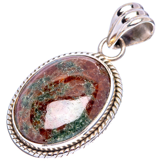 Oval grass garnet pendant in .925 sterling silver with rope border and top loop bail
