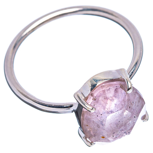 Faceted cacoxenite ring on sterling silver band, oval pink-lavender stone in four-prong setting