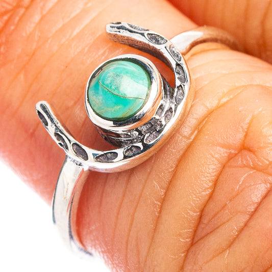 Turquoise horseshoe ring in .925 sterling silver with oval turquoise stone, close-up