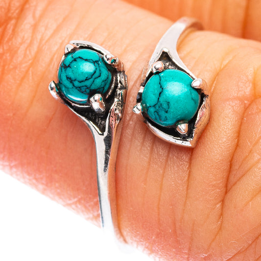 Sterling silver turquoise ring, two bezel-set cabochons on open shank
