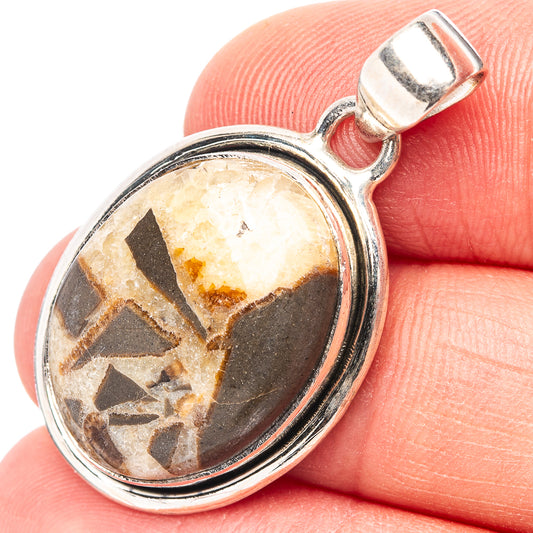 Oval septarian nodule pendant .925 sterling silver, close-up bail over polished stone