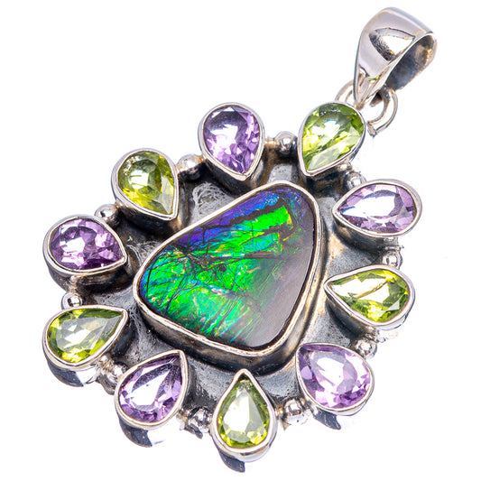Sterling silver heart pendant with green ammolite center and purple and peridot teardrop stones
