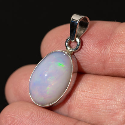 Oval opal pendant .925 sterling silver with top loop, rainbow iridescent sheen