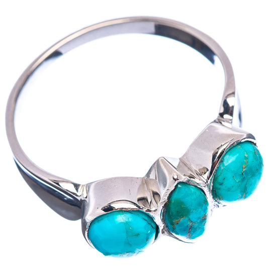 Sterling silver band ring with three oval turquoise cabochon stones, bezel set