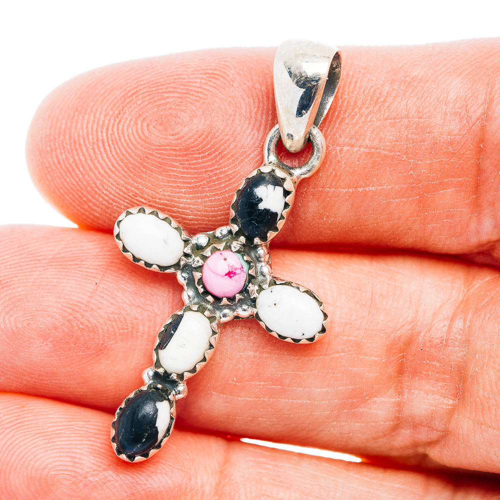 Sterling silver cross pendant with white buffalo, pink stone, and dark inlay accents