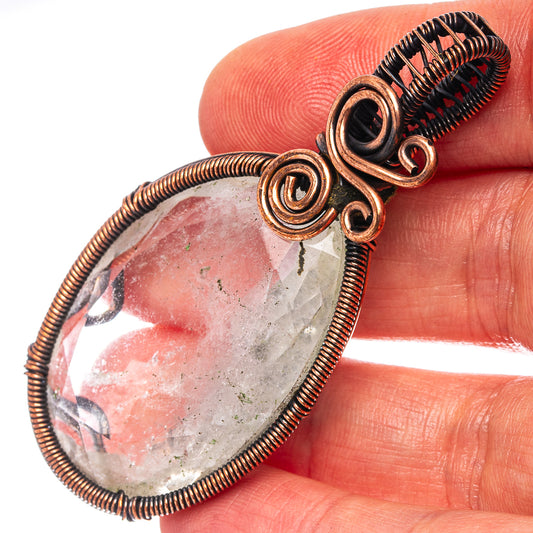 Oxidized copper wire-wrap pendant with pink teardrop quartz and spiral bezel