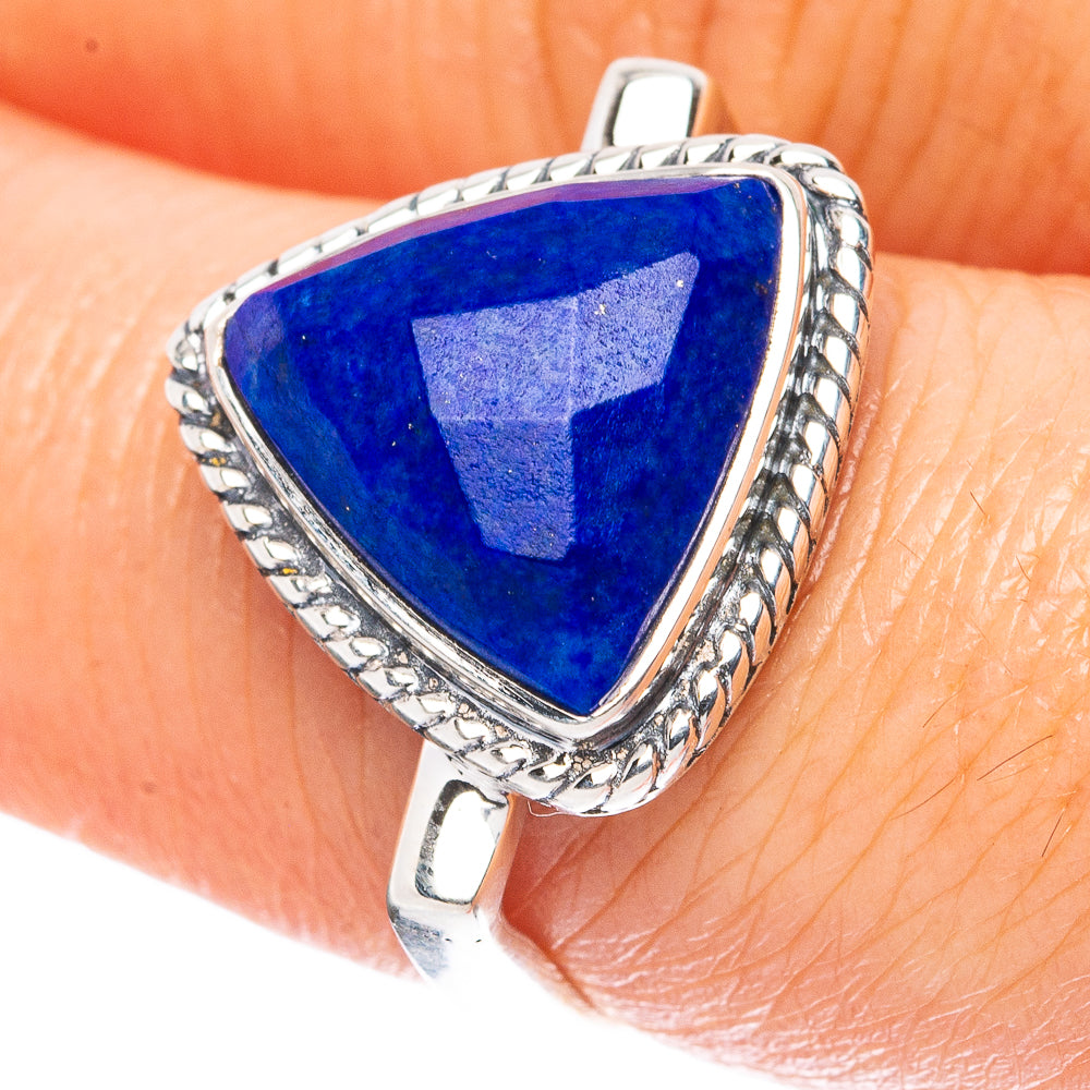 Lapis lazuli ring with triangular blue stone and ornate sterling silver bezel