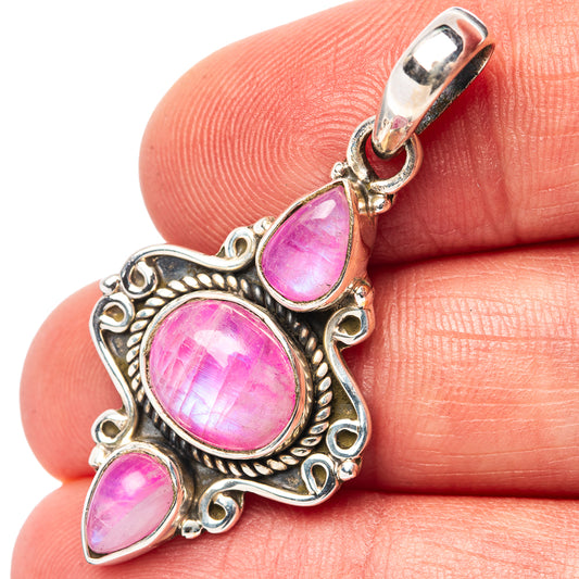 Sterling silver pink moonstone pendant close-up with oval and teardrop stones, bail top