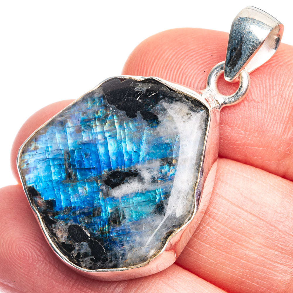 Sterling silver moonstone pendant with irregular blue rainbow flash stone and loop bail