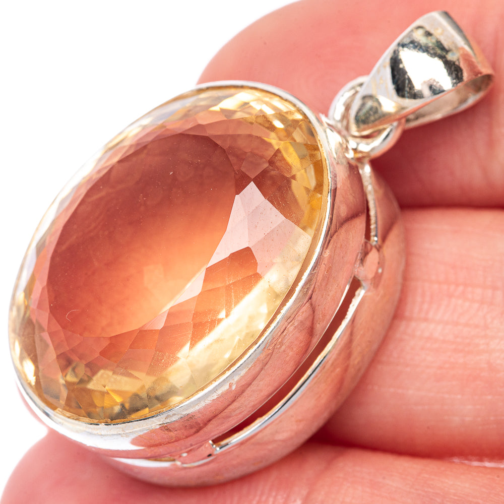 Faceted citrine pendant in oval bezel, 925 sterling silver bail