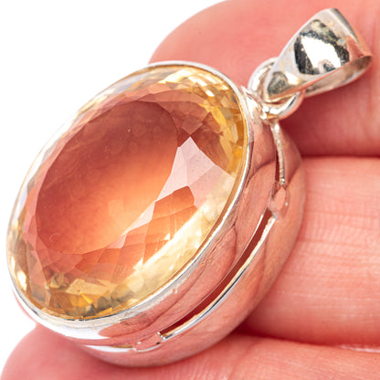 Faceted citrine pendant in oval bezel, 925 sterling silver bail