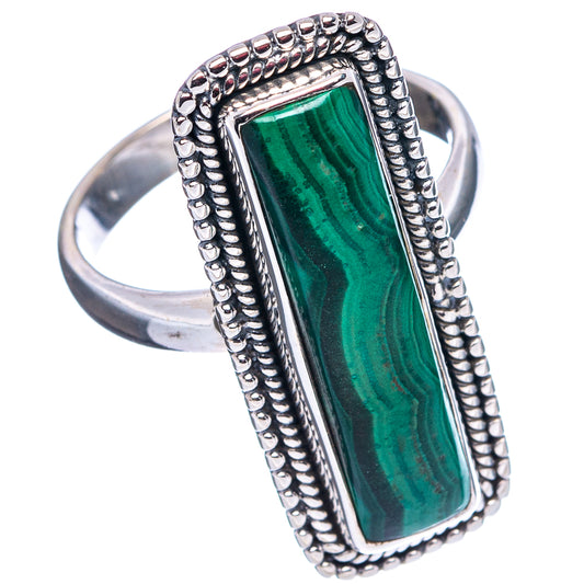 Sterling silver ring with rectangular green malachite stone framed by bead trim