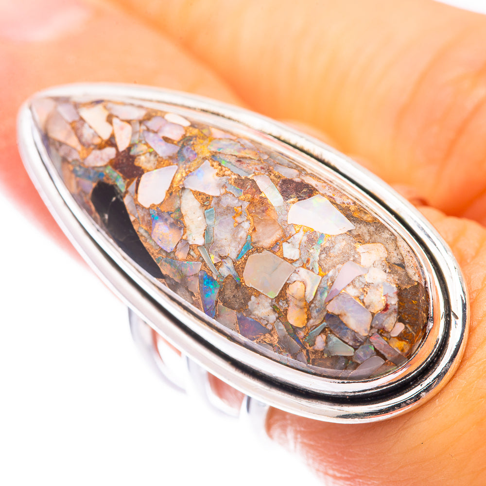 Oval sterling silver ring with opal mosaic inlay, multicolor stone center