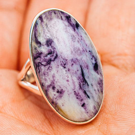 Kammererite ring on hand, oval purple-white stone in .925 sterling silver bezel, size 9