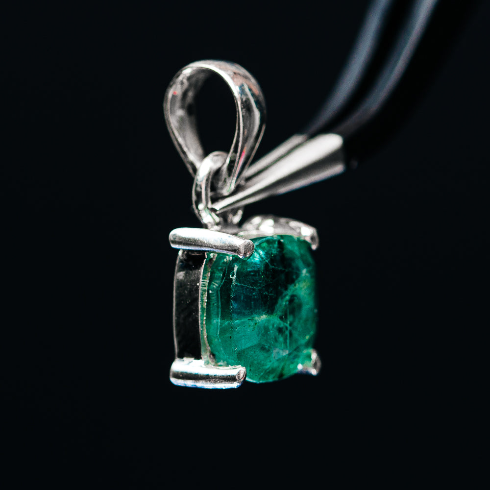 Sterling silver pendant with emerald-green cushion-cut stone and open setting prongs