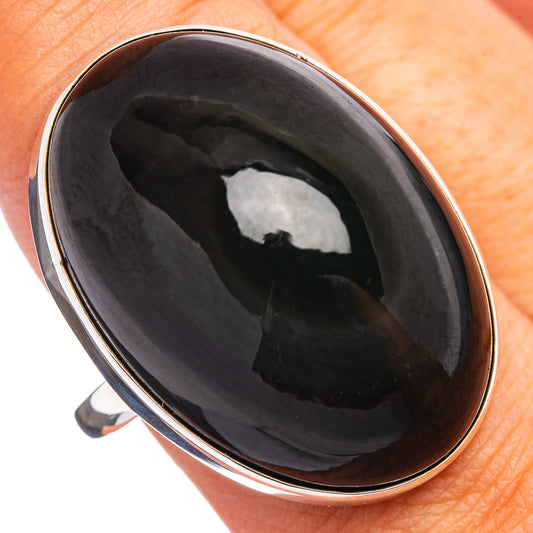 Sterling silver ring with oval dark obsidian stone, glossy black