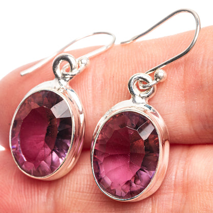 Oval faceted gemstone earrings in sterling silver, deep purple