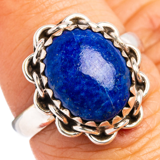 Oval blue lapis lazuli gemstone ring in sterling silver with braided border