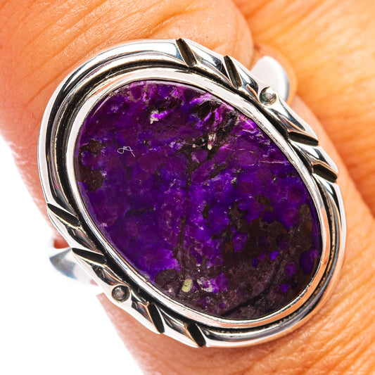 Sterling silver sugilite ring with oval purple gemstone and decorative bezel, size 8.75