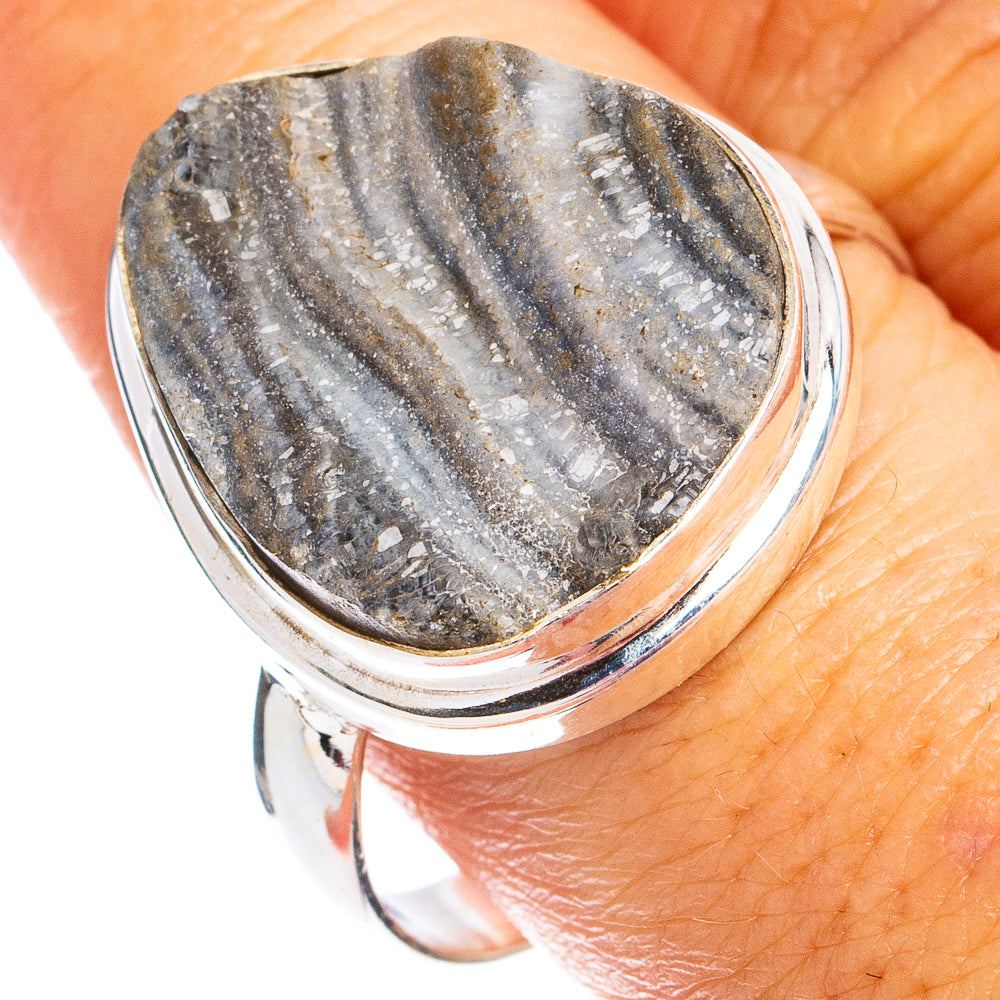 Sterling silver ring with faceted gray druzy oval stone bezel