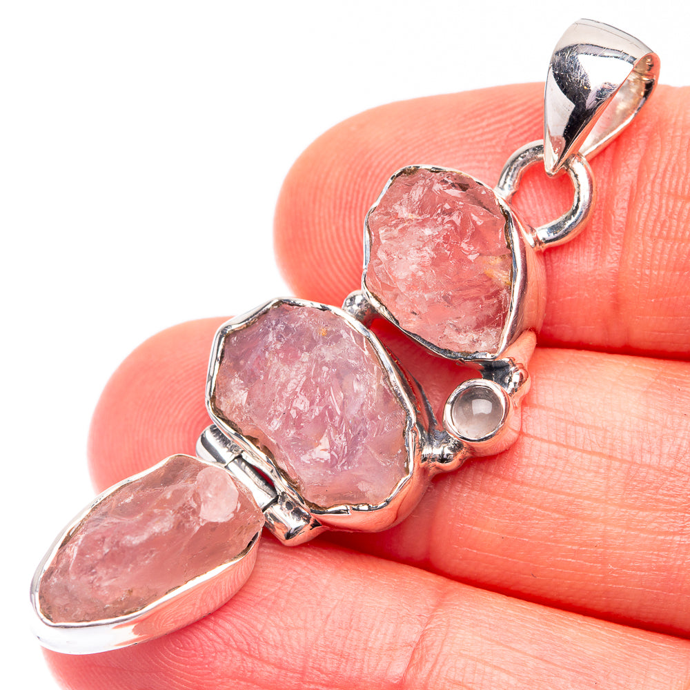 Sterling silver pendant with three rough pink rose quartz stones in bezel settings