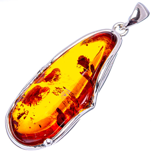 Amber teardrop pendant with .925 sterling silver bezel, warm yellow-red stone.