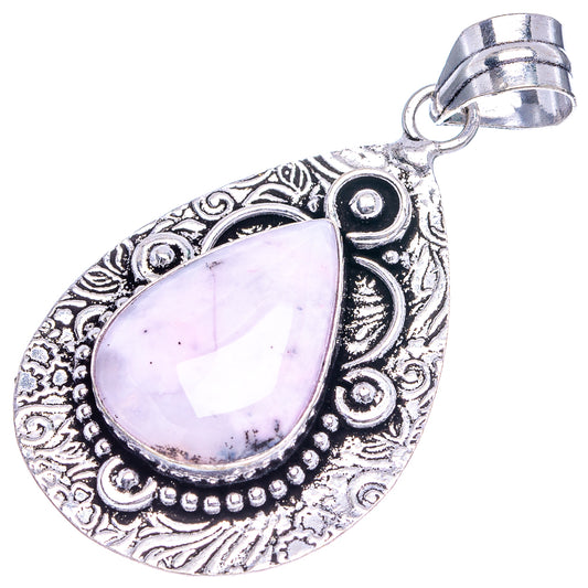 Dendritic opal pendant, teardrop lavender cabochon with scrolling silver-toned bezel and loop bail.